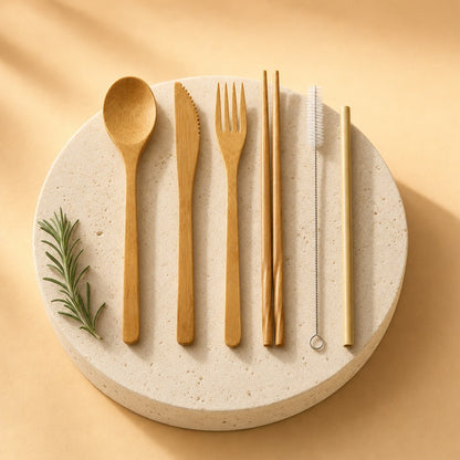 Bamboo travel cutlery set on a stone pedestal